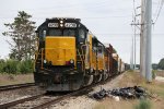 Three WAMX SD's sit with their train in the siding just north of town